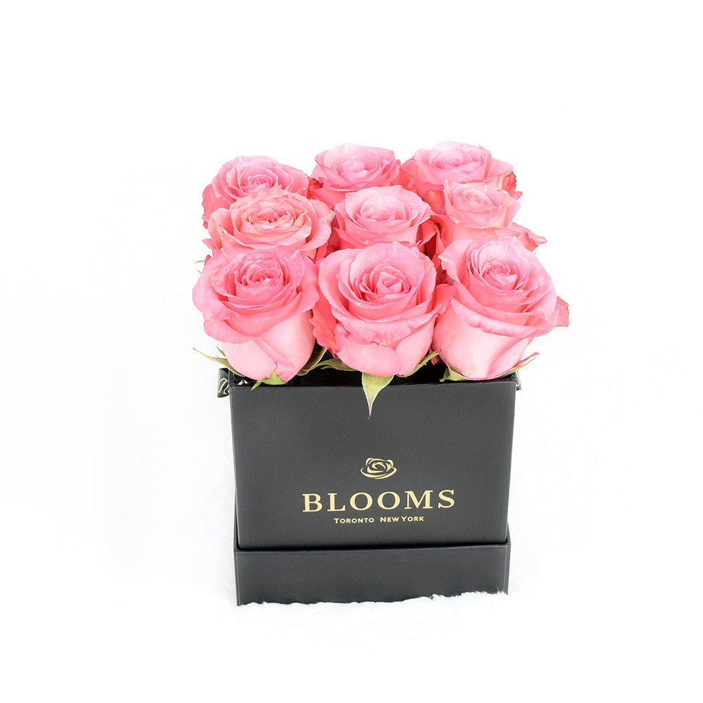 Impeccable pink rose hat box arrangement. Same Day Toronto Delivery.
