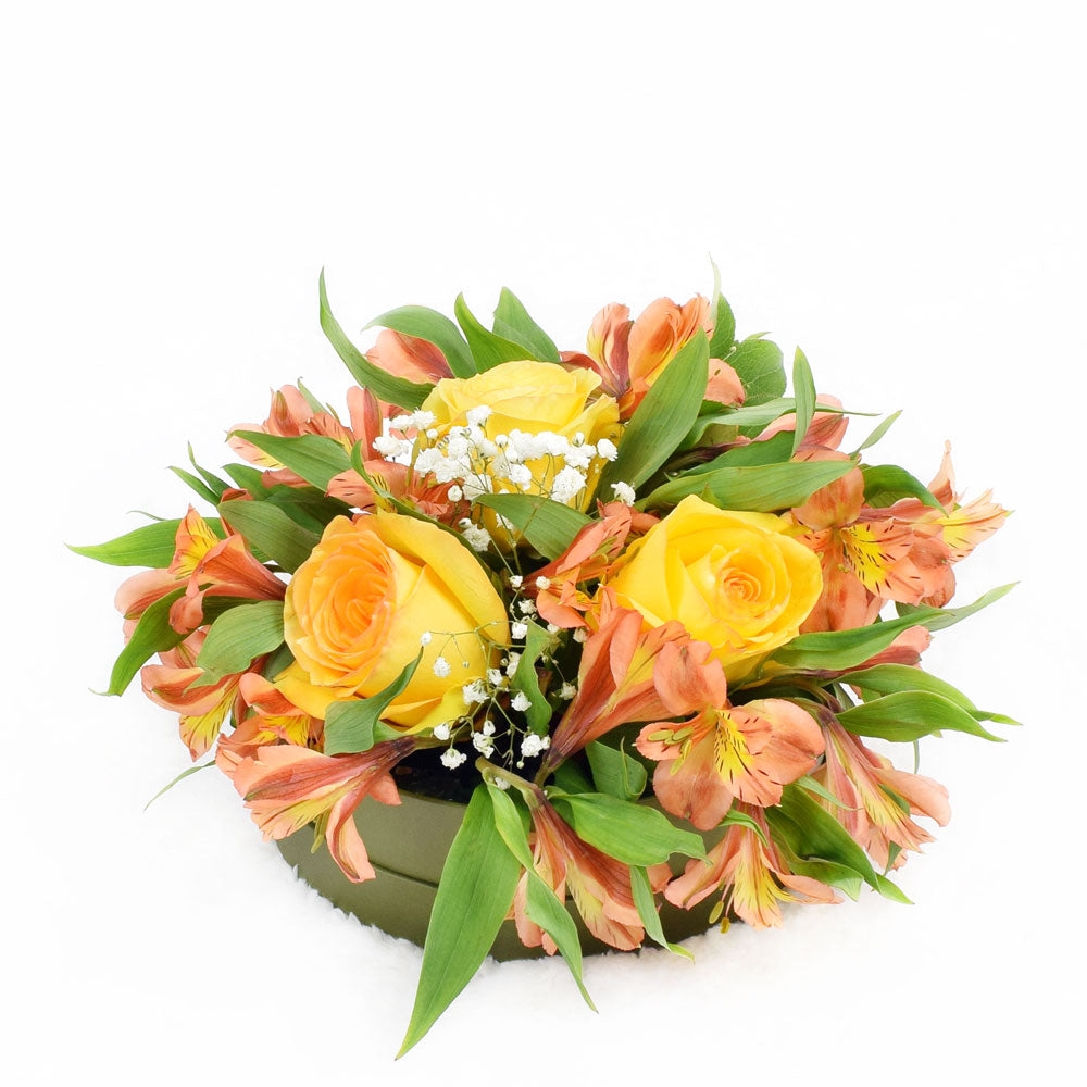 Autumnal floral hat box arrangement in yellows and oranges. Same Day Toronto Delivery.