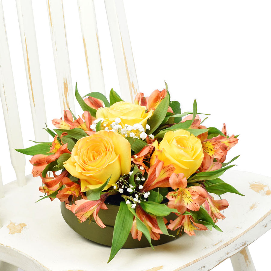 Autumnal floral hat box arrangement in yellows and oranges. Same Day Toronto Delivery.