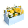 Yellow and white mixed floral arrangement in a blue toolbox. Same Day Toronto Delivery