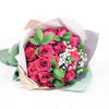 bouquet with pink roses, ruscus and baby's breath wrapped in floral wrap and designer ribbon, Same Day Toronto Delivery